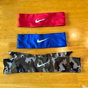 Bundle of 3 Nike headbands.